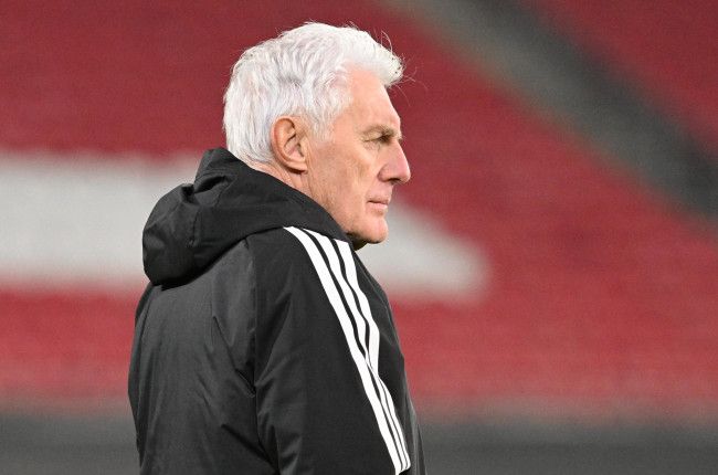 Broos defends controversial call to have all 32 players at announcement dinner